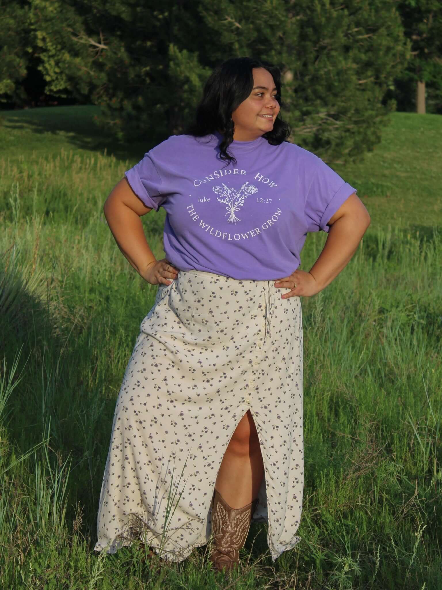 Consider How the wildflowers grow graphic tshirt featuring a floral design on a comfort colors violet tee - Christian clothing - faith apparel